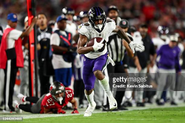 Demarcus Robinson of the Baltimore Ravens carries the ball during the second quarter of an NFL football game against the Tampa Bay Buccaneers at...