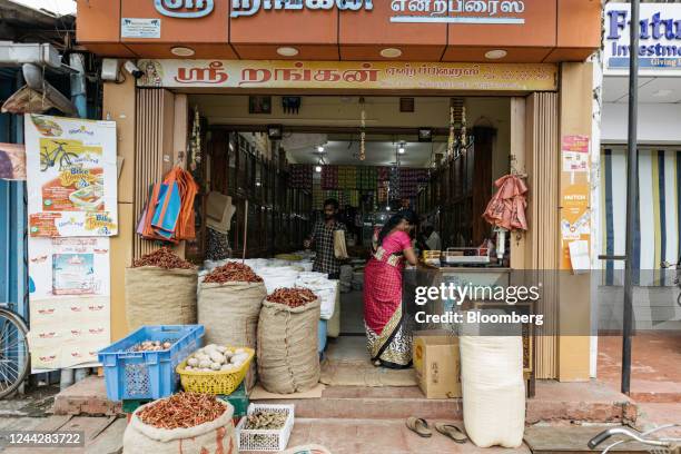 Customers browse spices at a store in Jaffna, Sri Lanka, on Tuesday, Oct. 25, 2022. Sri Lankas 70% inflation is hitting its peak as crippling...