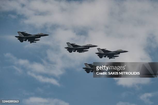 Hellenic Air Force F-16 fly during a military parade in Thessaloniki, on October 28 during the celebrations marking Greece's National "Oxi" Day,...