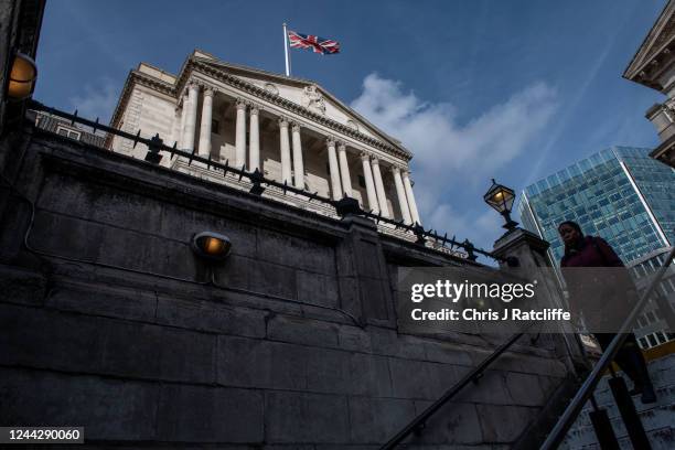 Woman walks down to Bank underground station next to the Bank of England on October 28, 2022 in London, England. The country's chancellor and prime...