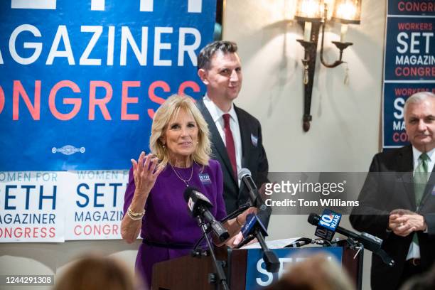 First lady Jill Biden speaks during a campaign event for Seth Magaziner, background, Democratic candidate for Rhode Island's Second Congressional...
