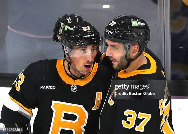 Brad Marchand & Patrice Bergeron Hug During Bergeron's Final Game Boston Bruins Photo