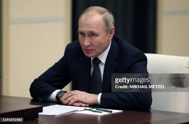 Russian President Vladimir Putin attends a meeting with Defence Minister at the Novo-Ogaryovo state residence, outside Moscow, on October 28, 2022. -...