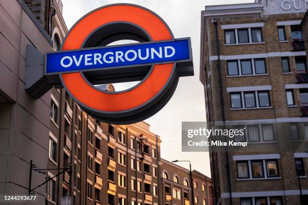 London Overground roundel sign outside Wapping station on 17th October 2022 in London, United Kingdom. The London Underground is a public rapid...