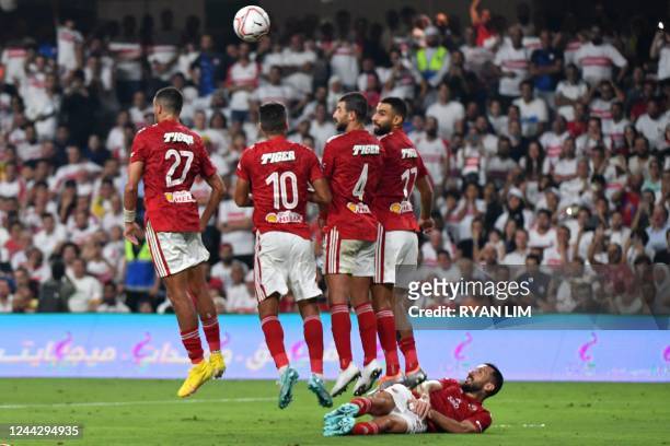 Ahly's players try to block a free kick during the Egyptian Super Cup football match between Zamalek and Al-Ahly at the Hazza bin Zayed stadium in...
