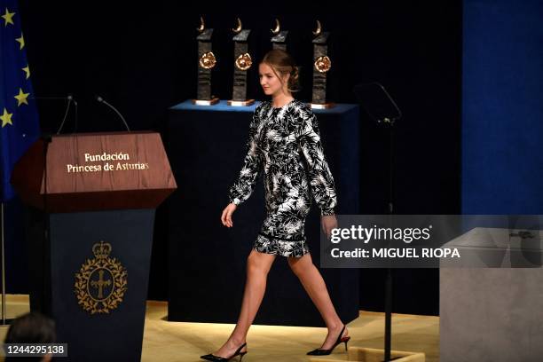 Spanish Crown Princess of Asturias Leonor walks on stage to deliver a speech during the 2022 Princess of Asturias award ceremony at the Campoamor...