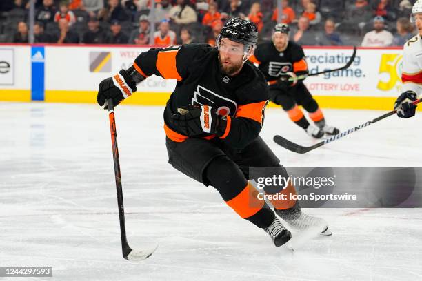 Philadelphia Flyers Defenseman Ivan Provorov chases the puck during the third period of the National Hockey League game between the Florida Panthers...