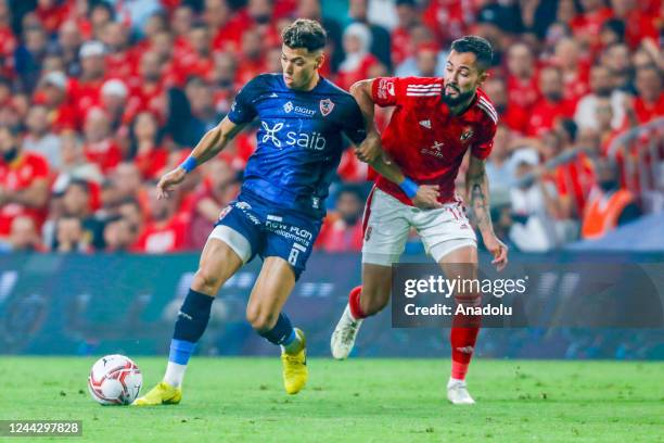 Emam Ashour of Zamalek in action against El Ahli Bruno Savio of Al Ahly during the Egyptian Super Cup final match between Zamalek and Al Ahly at...