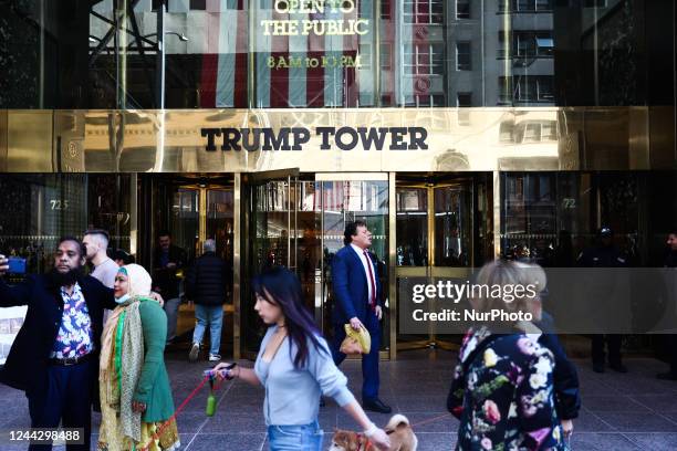 People are seen in front of the Trump Tower in New York City, United States on October 22, 2022.