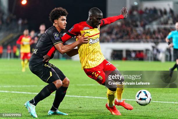 Zakaria Aboukhlal of Toulouse FC competes for the ball with Massadio Haidara of RC Lens during the Ligue 1 match between RC Lens and Toulouse FC at...