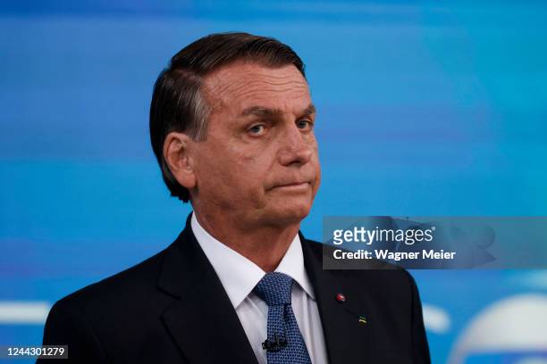 Incumbent and presidential candidate for a second term Jair Bolsonaro of Liberal Party gestures before a debate organized by Brazilian media...