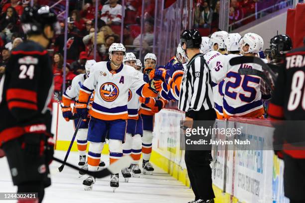 Josh Bailey of the New York Islanders scores a goal during the second period of his 1,000th NHL game while playing against the Carolina Hurricanes at...