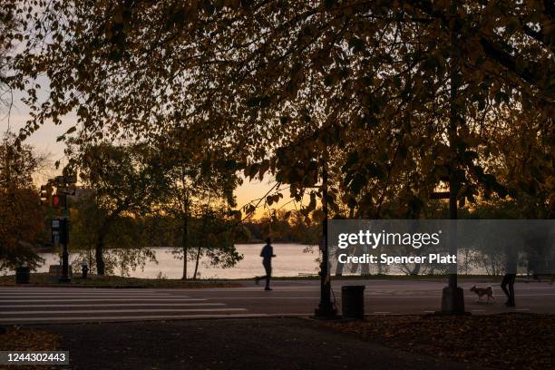 People enjoy Brooklyn's Prospect Park as trees near their peak autumn foliage on October 27, 2022 in New York City. New York's foliage, especially...