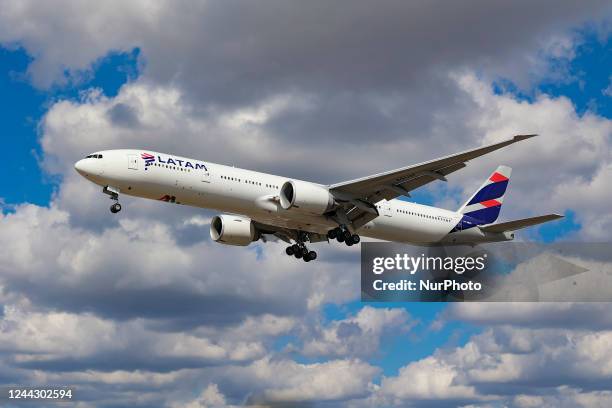 Airlines Brasil Boeing 777 aircraft as seen on final approach flying over the houses of Myrtle avenue in London, a famous location for plane...