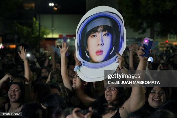 Fans of South Korean K-Pop boy band unable to attend the show, gather outside the River Plate's Monumental stadium to listen to Kim Seok-jin -aka...