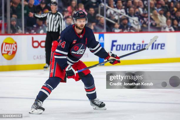 Josh Morrissey of the Winnipeg Jets skates during second period action against the St. Louis Blues at Canada Life Centre on October 24, 2022 in...