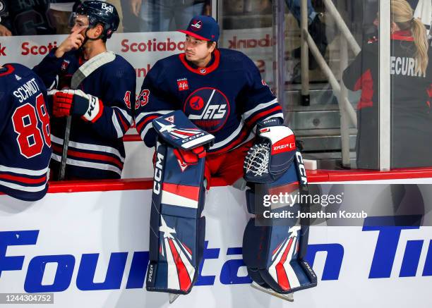 Goaltender David Rittich of the Winnipeg Jets sits on the boards after the final buzzer against the St. Louis Blues at Canada Life Centre on October...