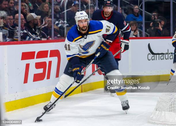 Robert Bortuzzo of the St. Louis Blues plays the puck during second period action against the Winnipeg Jets at Canada Life Centre on October 24, 2022...