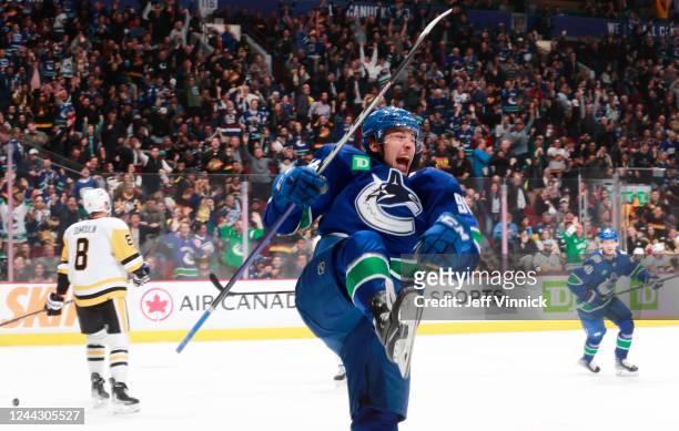 Andrei Kuzmenko of the Vancouver Canucks celebrates after scoring against the Pittsburgh Penguins during their NHL game at Rogers Arena October 28,...
