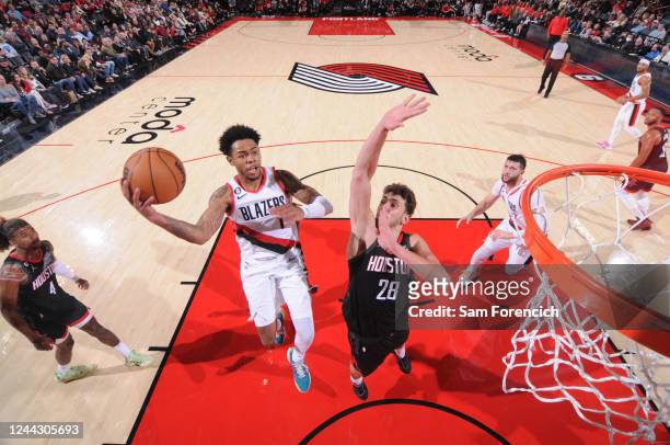 Anfernee Simons of the Portland Trail Blazers drives to the basket against the Houston Rockets on October 28, 2022 at the Moda Center Arena in...