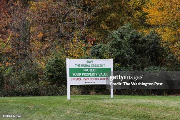 Sign advocating for protecting the areas national parks on the side of the road at the proposed site of the Prince William Digital Gateway, which...