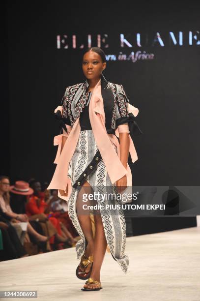 Model walks the runway to show designs by Elie Kuame, an Ivorian/ Lebanese designer, during the Lagos Fashion Week in Lagos on October 28, 2022. -...