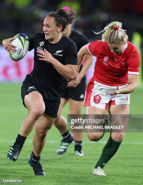 New Zealands Portia Woodman makes a break during the New Zealand 2021 Womens Rugby World Cup quarter-final match between New Zealand and Wales at the...