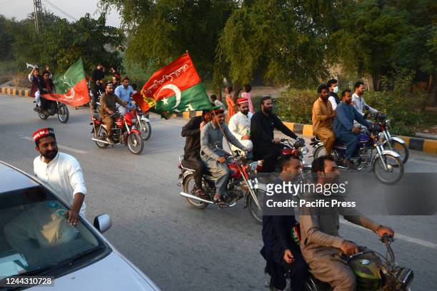 Activists of opposition party Pakistan Tehreek-e-Insaf in Peshawar, take part in an anti-governmental rally demanding an early election. Former...