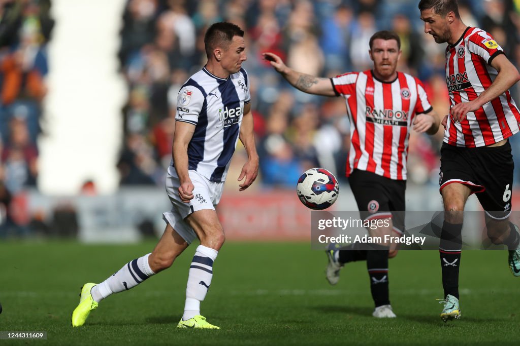 Jed Wallace of West Bromwich Albion and Chris Basham of Sheffield