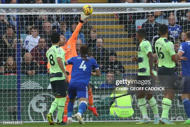Manchester City's Brazilian goalkeeper Ederson saved a shot from Leicester City's Belgian midfielder Youri Tielemans during the English Premier...