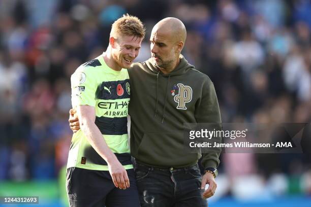 Kevin De Bruyne of Manchester City and Pep Guardiola the head coach / manager of Manchester City during the Premier League match between Leicester...