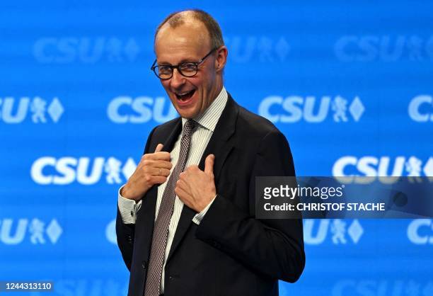 Germany's conservative Christian Democratic Union party leader Friedrich Merz reacts after his speech at the party congress of the conservative...