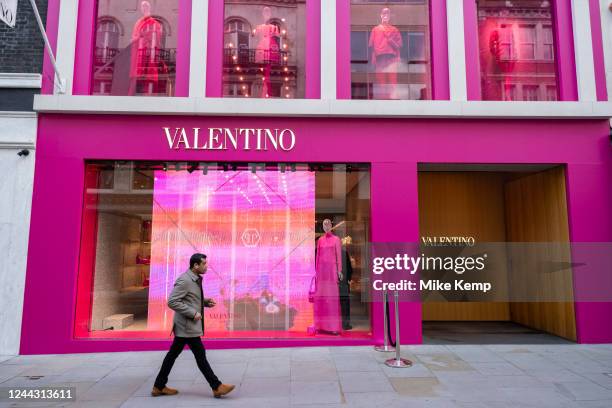 People pass the pink shop front for the Valentino store on Bond Street on 13th October 2022 in London, United Kingdom. Bond Street is one of the...