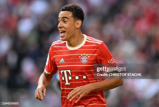 Bayern Munich's German midfielder Jamal Musiala celebrates after scoring the 2-0 goal during the German first division Bundesliga football match...