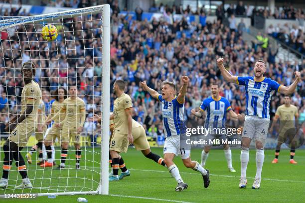 Brighton & Hove Albion players celebrate after their third goal during the Premier League match between Brighton & Hove Albion and Chelsea FC at...