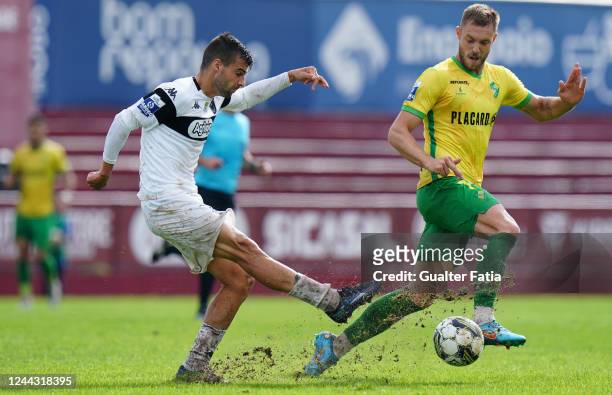 Frederic Maciel of SCU Torreense with Pedro Lucas of CD Mafra in action during the Liga Portugal 2 match between SCU Torreense and CD Mafra at...
