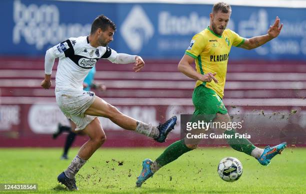 Frederic Maciel of SCU Torreense with Pedro Lucas of CD Mafra in action during the Liga Portugal 2 match between SCU Torreense and CD Mafra at...