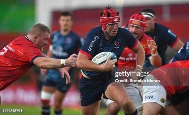 Limerick , Ireland - 29 October 2022; Tom Stewart of Ulster is tackled by John Ryan of Munster during the United Rugby Championship match between...