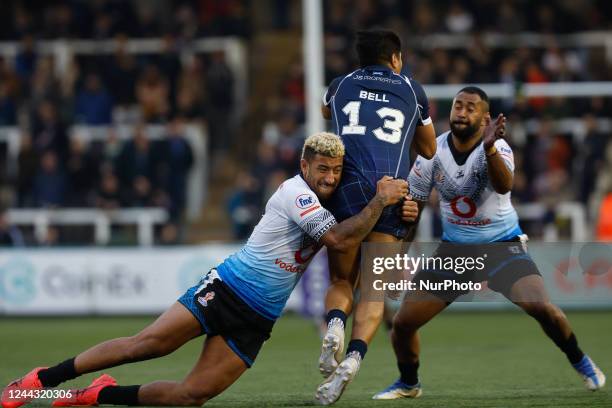 Viliame Kikau of Fiji tackles James Bell of Scotland during The 2021 Rugby League World Cup Pool B match between Fiji and Scotland at Kingston Park,...