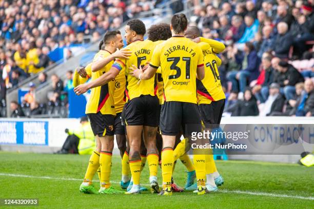 Joao Pedro of Watford celebrates his goal with team-mates during the Sky Bet Championship match between Wigan Athletic and Watford at the DW Stadium,...