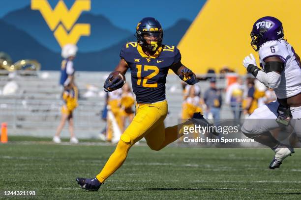 West Virginia Mountaineers running back CJ Donaldson runs the football during the second quarter of the college football game between the TCU Horned...