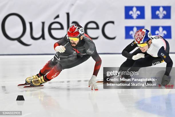 Steven Dubois of Canada skates ahead of Kyung Hwan Hong of the Republic of Korea in the men's 1500 meter semifinal during the ISU World Cup Short...