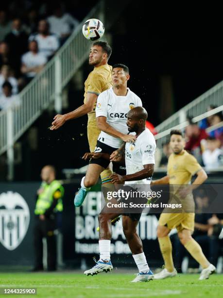 Mouctar Diakhaby of Valencia, Dimitri Foulquier of Valencia, Eric Garcia of FC Barcelona during the La Liga Santander match between Valencia v FC...