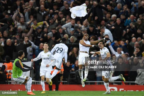 Leeds United's Dutch striker Crysencio Summerville celebrates scoring his team's second goal with teammates during the English Premier League...