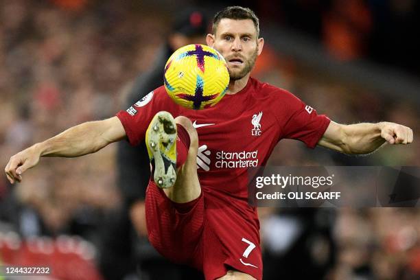 Liverpool's English midfielder James Milner controls the ball during the English Premier League football match between Liverpool and Leeds United at...