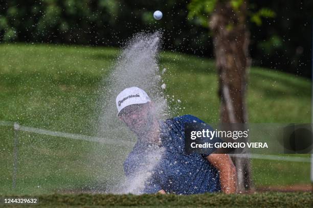 Golfer Dustin Johnson plays his shot from the sixth hole during the semifinals of the LIV Golf Invitational Miami 2022 at the Trump National Doral...