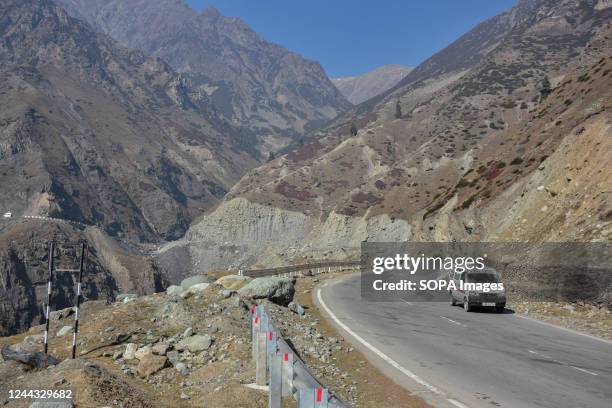 An ambulance moves along the Mughal road near the Pir Panjal Pass, also called Peer Ki Gali, about 100kms, south of Srinagar, the summer capital of...