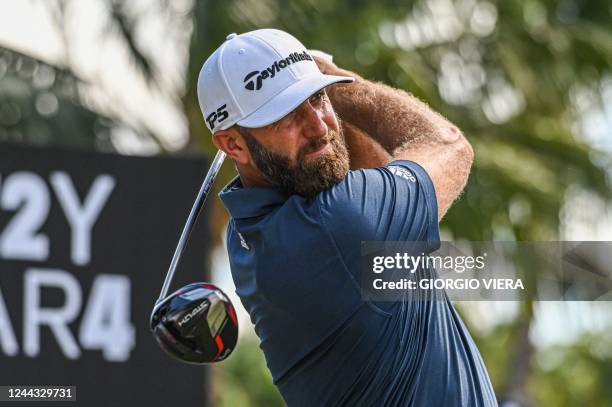 Golfer Dustin Johnson plays his shot from the seventh hole during the semifinals of the LIV Golf Invitational Miami 2022 at the Trump National Doral...