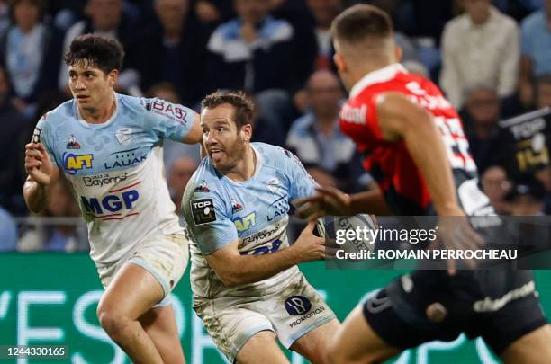 Bayonne' French fly half Camille Lopez runs with the ball during the French Top14 rugby union match between Aviron Bayonnais and Stade Toulousain...