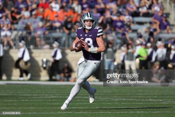 Kansas State Wildcats quarterback Will Howard rolls out looking to throw in the second quarter of a Big 12 college football game between the Oklahoma...